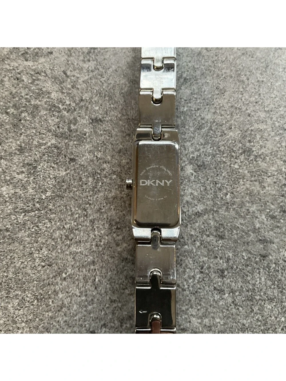 DKNY Womens Tank Style Watch 16mm Silver Tone Case & Band Black Dial B-I